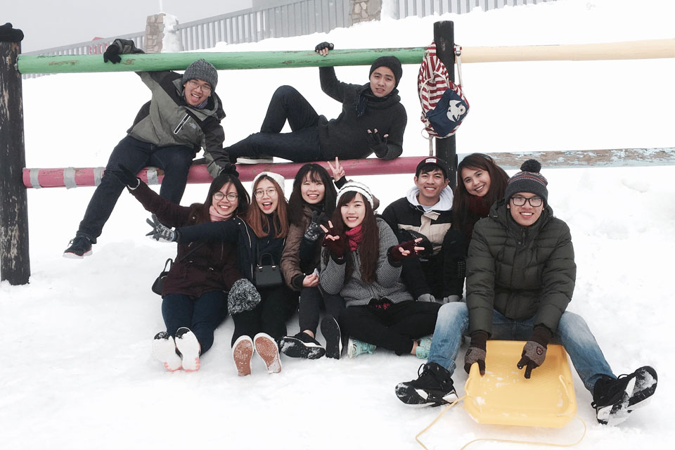 Exchange students playing in the snow