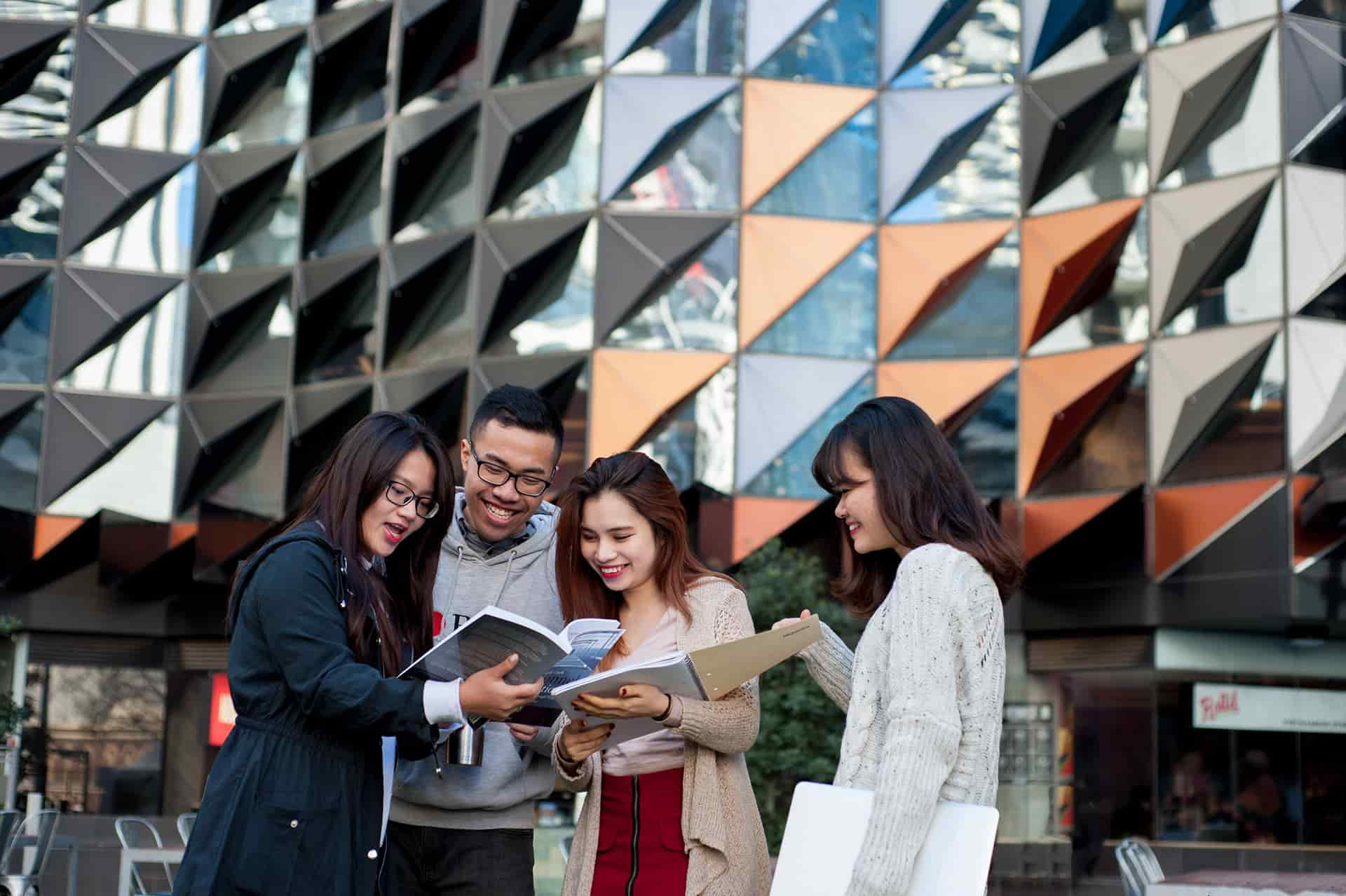 Vietnamese students in Melbourne, standing on Swanston Street