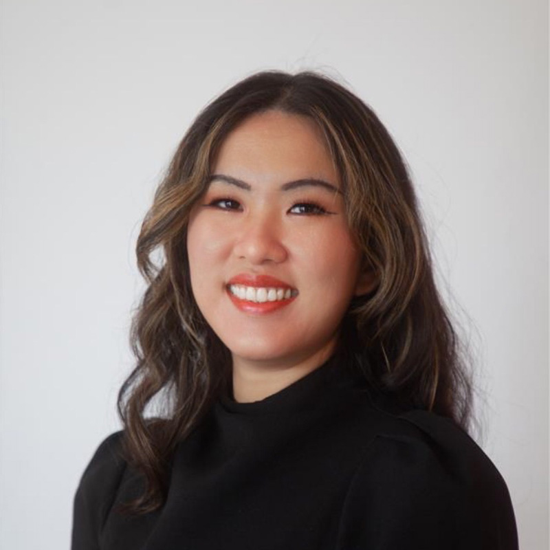 a headshot of a woman smiling 