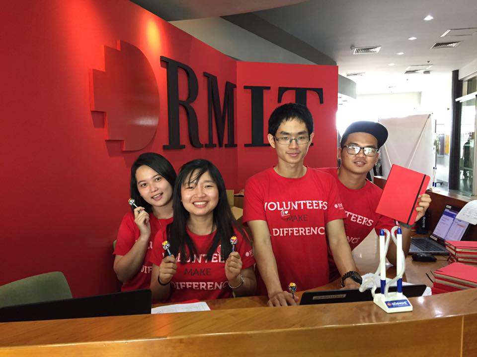 Phu (second from right) volunteering at the University.