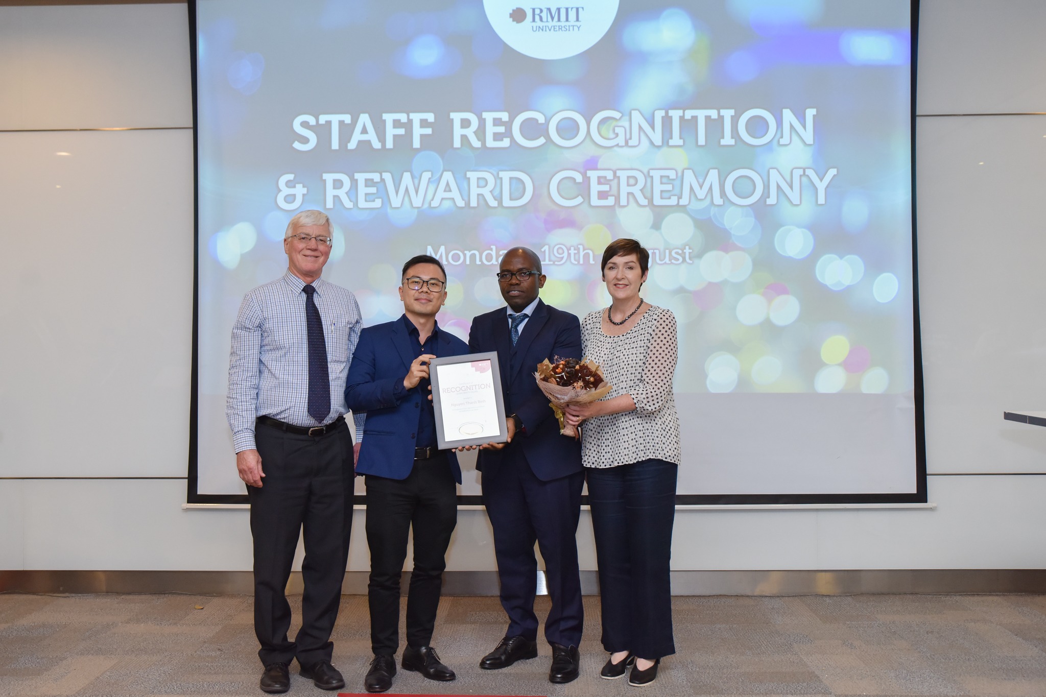 Acting Discipline Lead, Finance Nguyen Thanh Binh (centre) said he identifies most with RMIT’s Value, impact. 