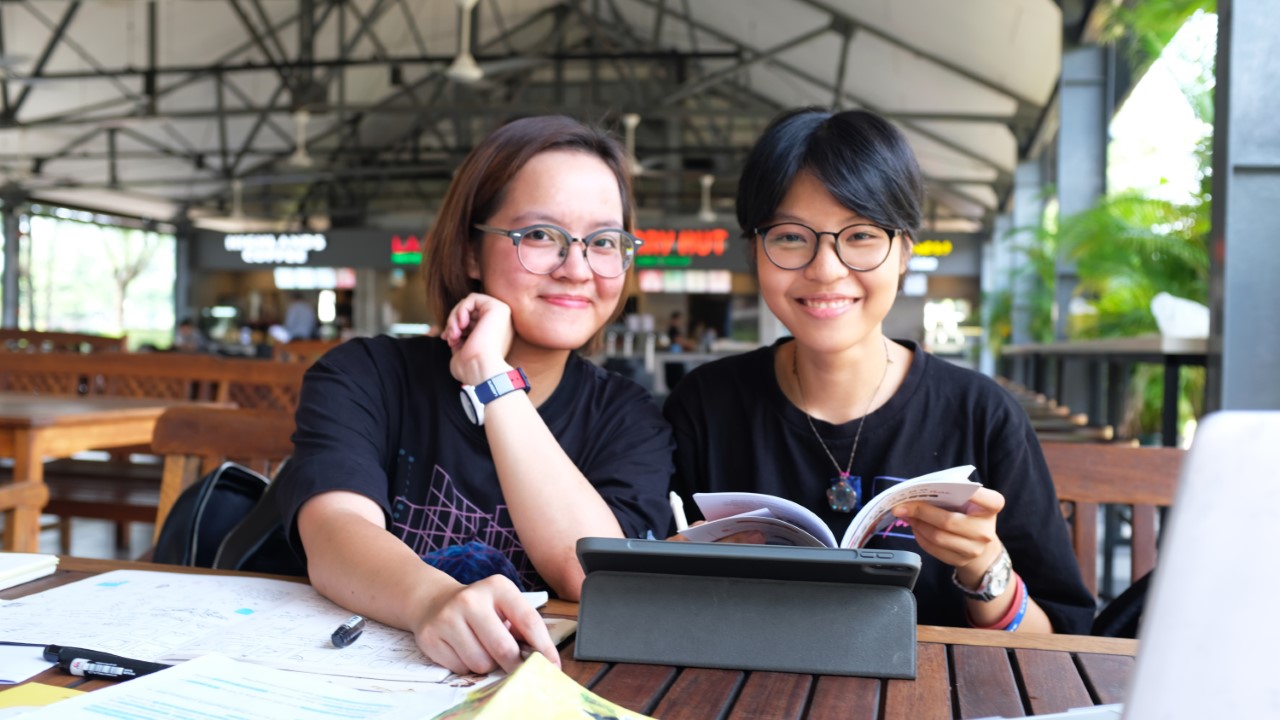 RMIT Vietnam Design Studies students Nguyen Tu Anh (left) and Nguyen Thi Thuy Linh created ‘Around Us’, a picture book dedicated to educating communities on the dangers of sexual abuse and sexual exploitation. 