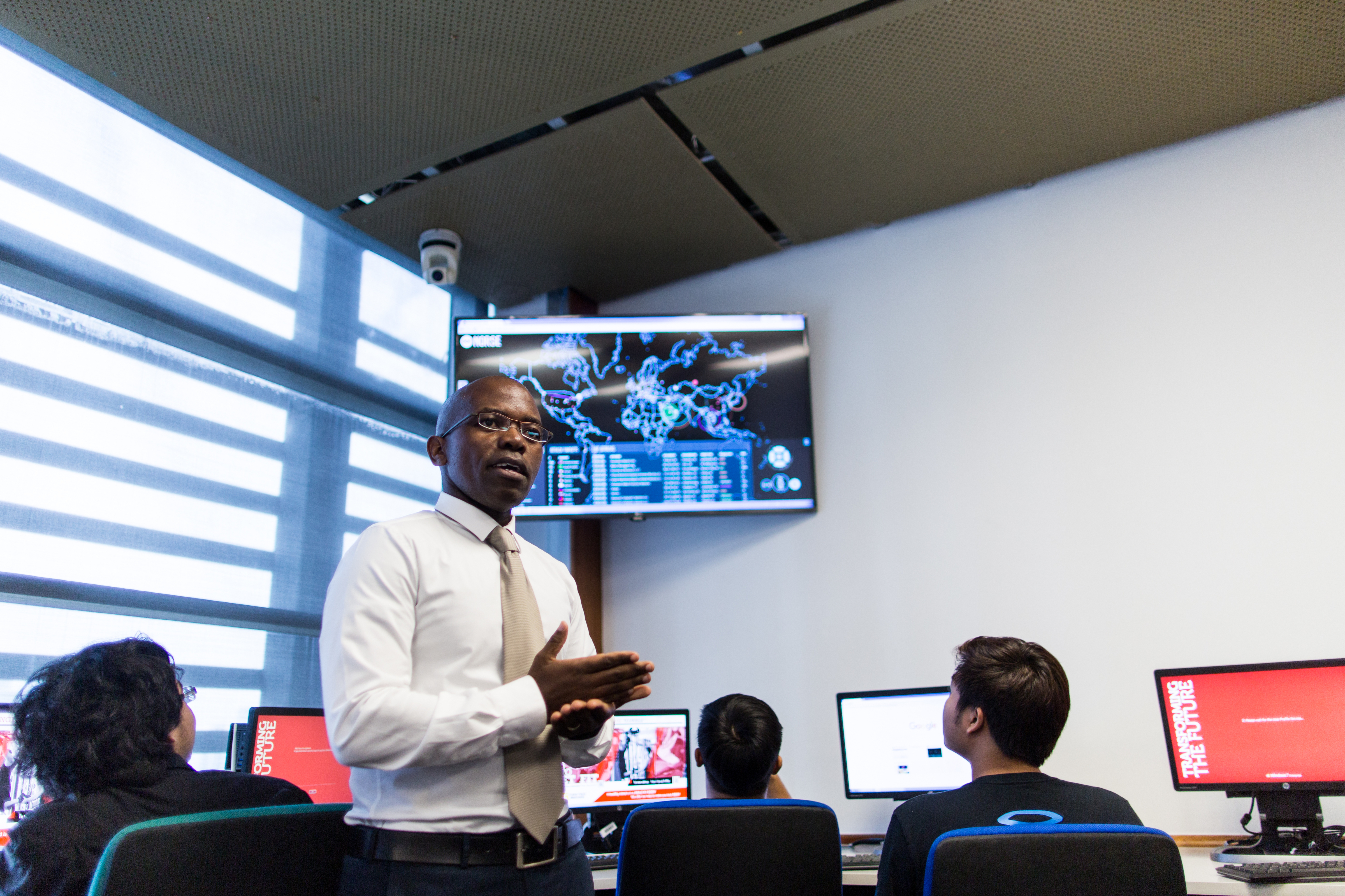 Associate Professor Matthews Nkhoma lectures in Cyber Security & Logistics Lab