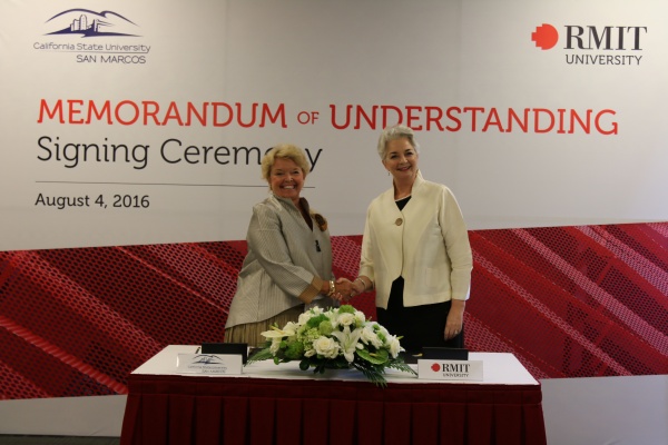 California State University, San Marcos President Karen S. Haynes (left) and RMIT Vietnam President Proffesor Gael McDonald at the signing ceremony