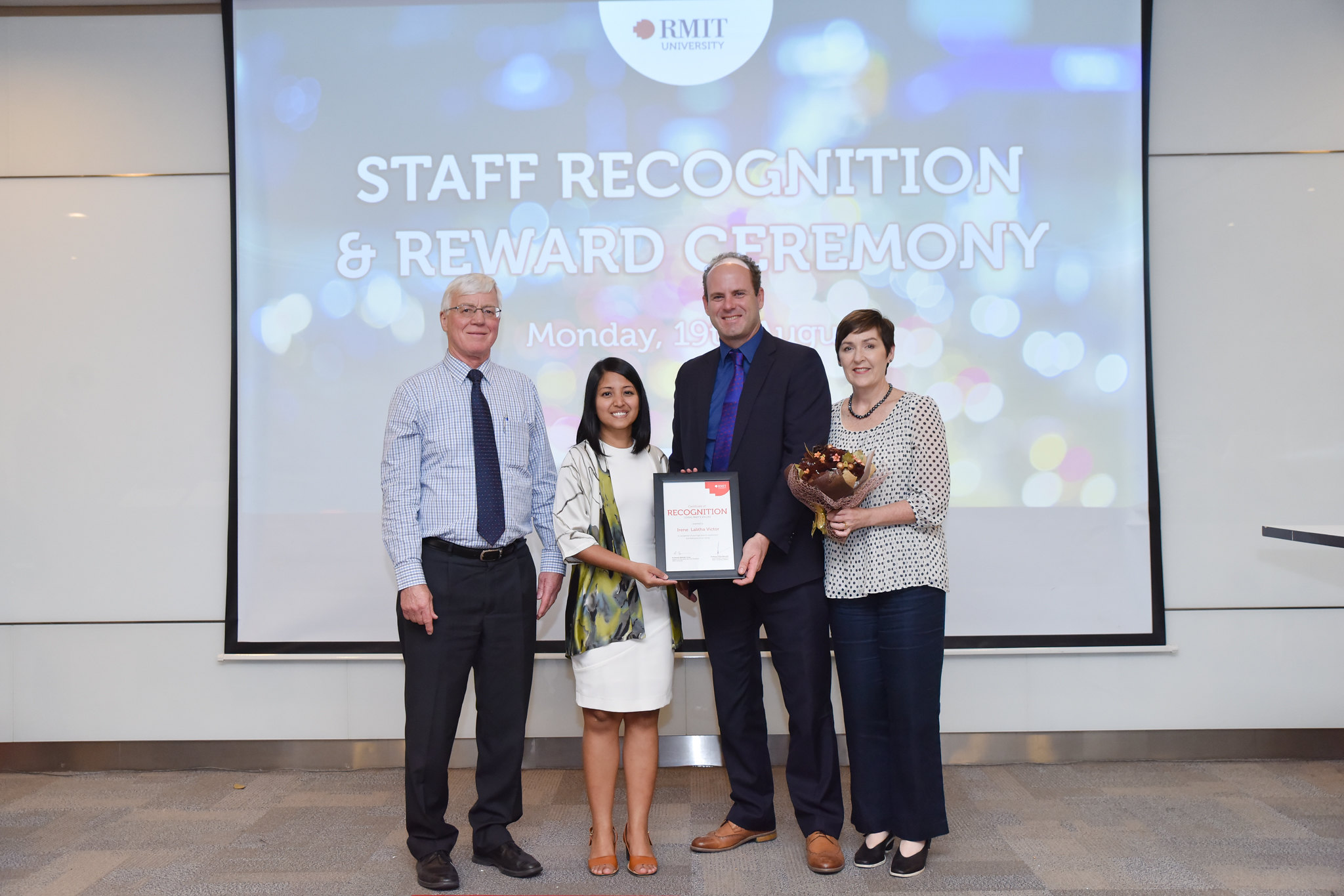 Educator Irene Victor (second from left) with Acting Deputy Vice-Chancellor Global Development Professor Peter Coloe (left), Head of School of English & University Pathways Mr Jake Heinrich (second from right) and Deputy Vice-Chancellor Education Professor Belinda Tynan (right).  