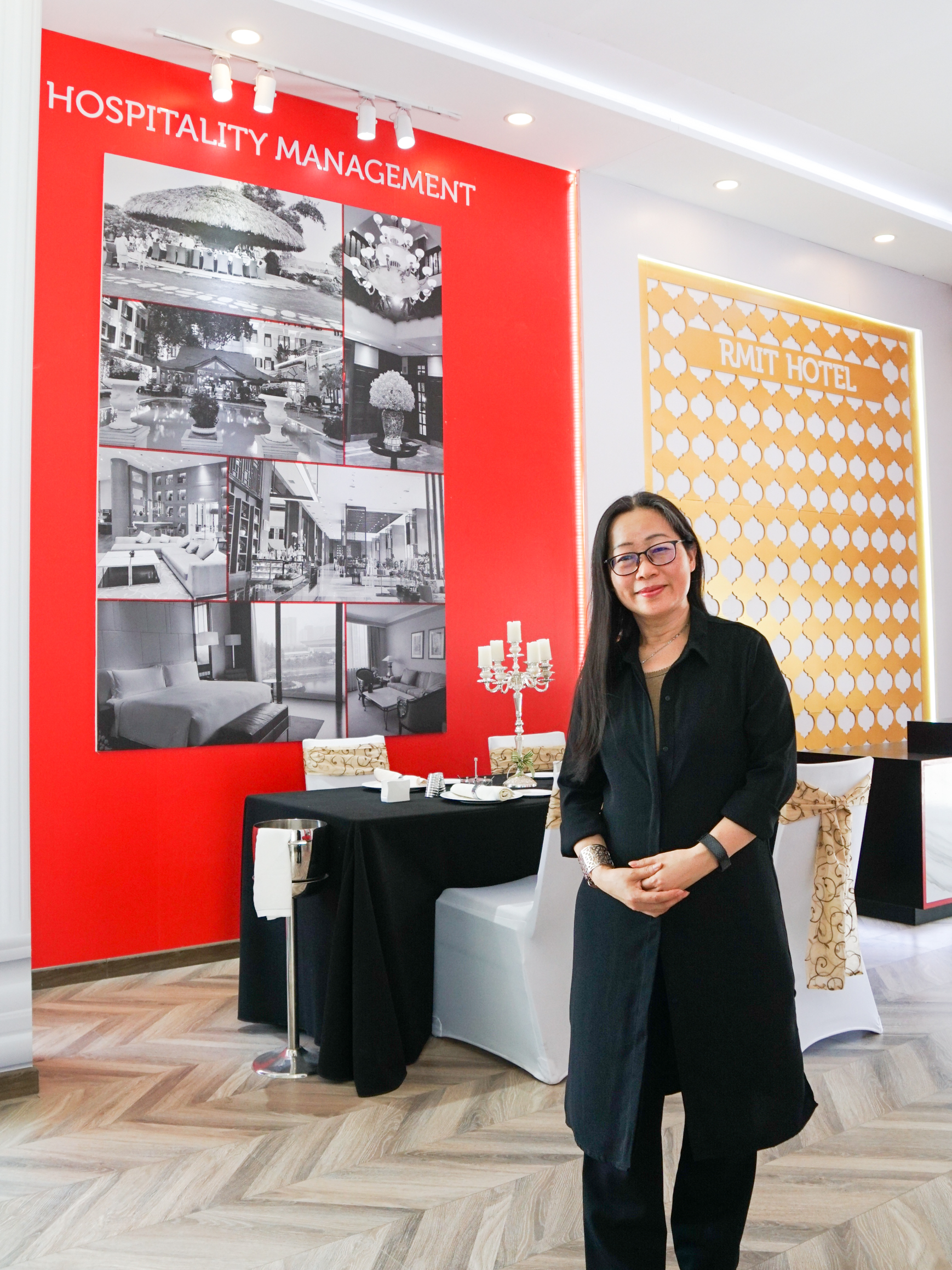 Dr Jackie Ong, Discipline Lead of the Tourism & Hospitality Management program at a mock RMIT hotel.