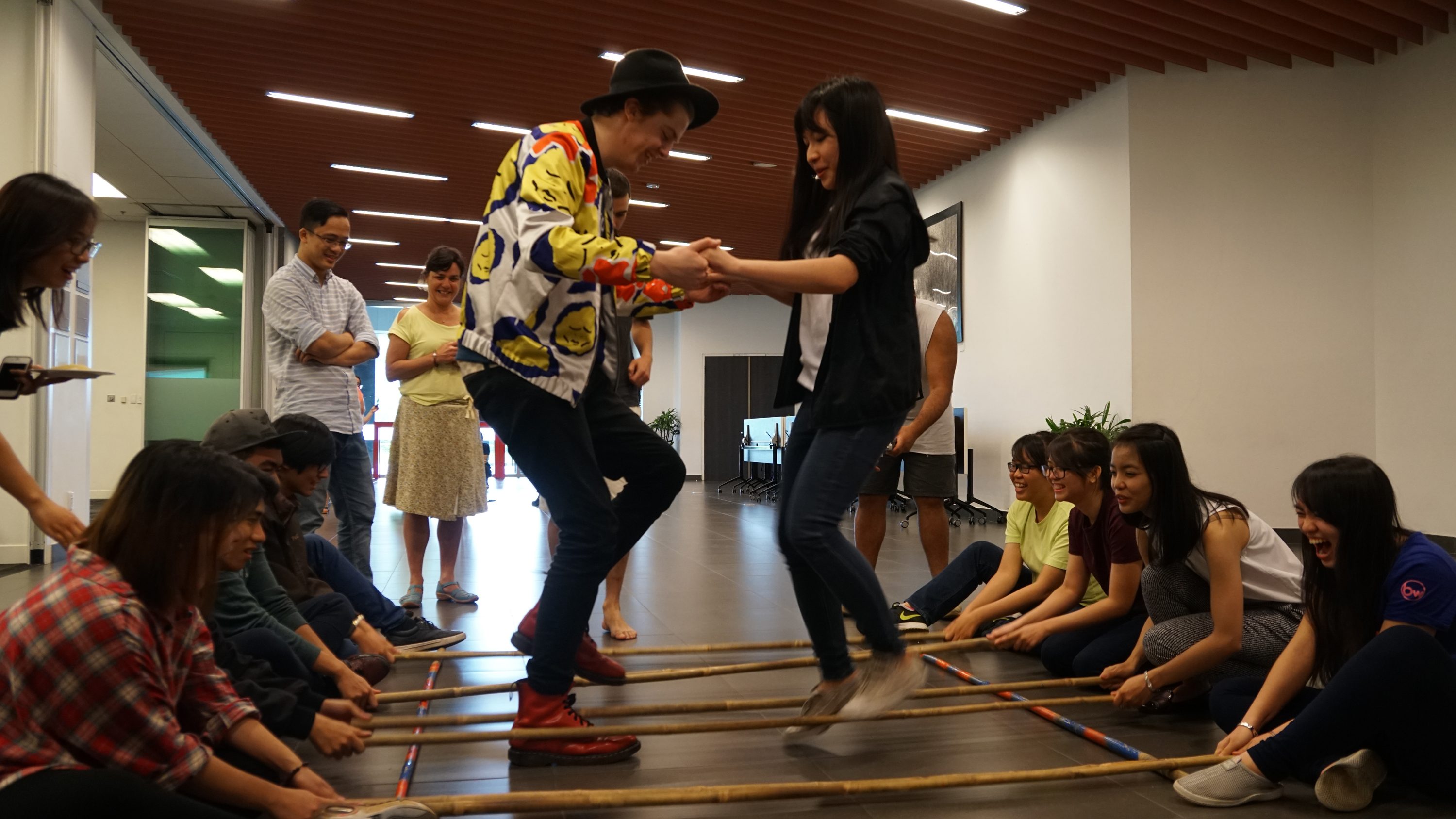 An RMIT Vietnam student demonstrated the bamboo dance which originated from the northwest highlands of Vietnam and is performed during special celebrations like Tet (Lunar New Year).