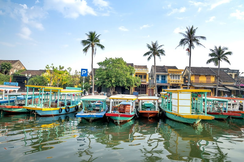Boats moaring in a river in Hoi An town