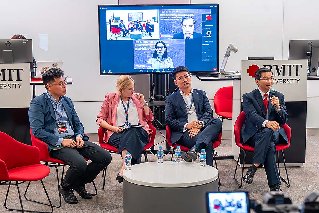 (L-R) Dr Truong Minh Huy Vu, Professor Claire Macken, Mr Le Minh Tuan, and Associate Professor Nguyen Quang Trung. The online speakers comprised Associate Professor Vu Minh Khuong and RMIT Director of Centre for Urban Research Professor Jago Dodson.