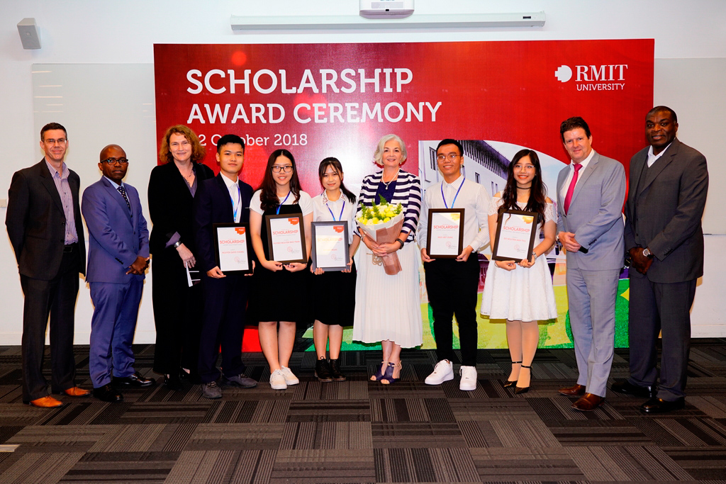 Scholarship recipients with the RMIT Vietnam Board at the scholarship ceremony. 