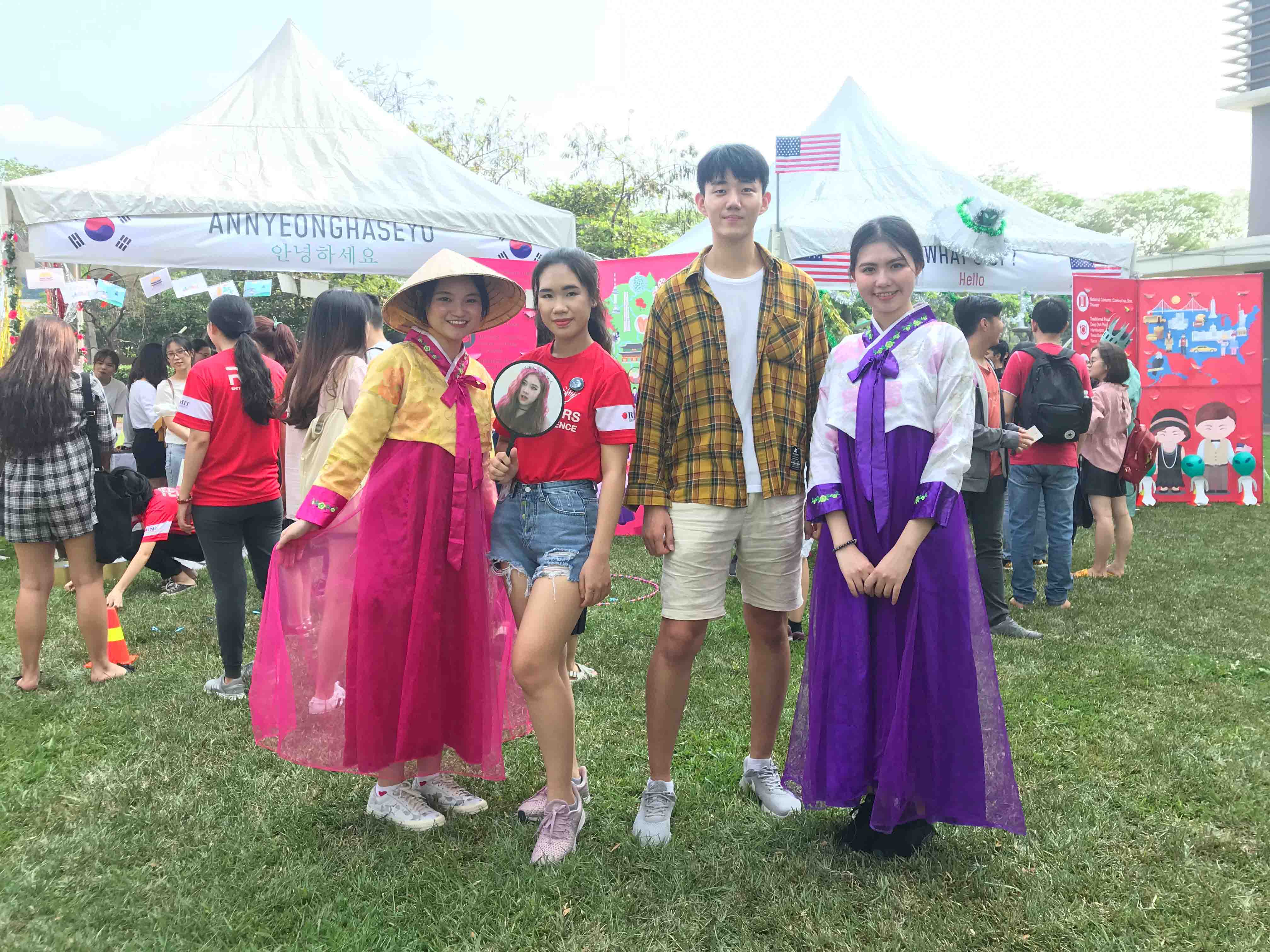 RMIT’s Bachelor of Information Technology student Sang Yeon Lee (in checkered shirt) attended the RMIT International Festival 2019 with Vietnamese students.