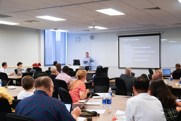 Dr Scott Hollier took audience to experience assistive technologies across a range of different devices including laptops, smartphones, tablets and digital assistants. 