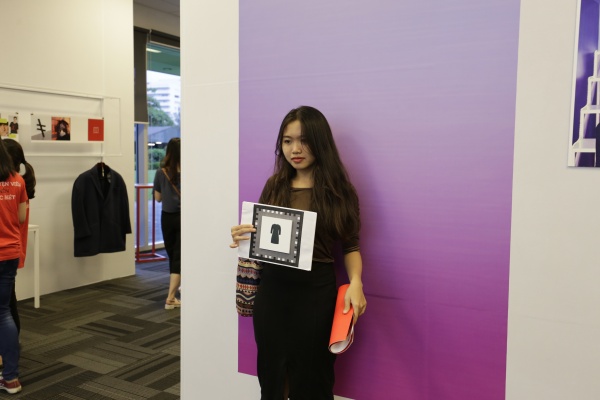 A student “tries on” a dress using augmented reality.
