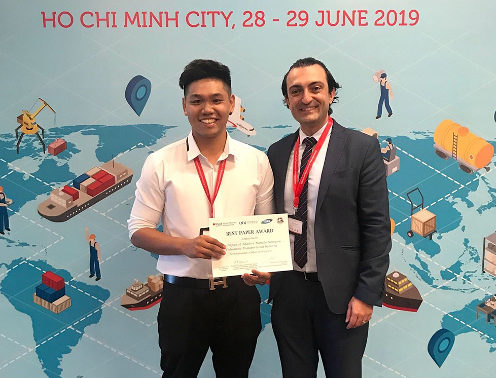 Ha Tuan Nghiep (left) and Dr Reza Akbari, Program Manager and senior lecturer at RMIT Vietnam School of Business & Management and the co-author of the research, received the “Best Paper Award” at the 12th International Conference of Asian Shipping and Logistics. 