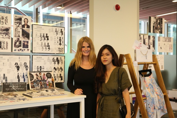 Associate Lecturer Victoria Eskdale (left) with a student at the Product Development end-of-semester showcase.