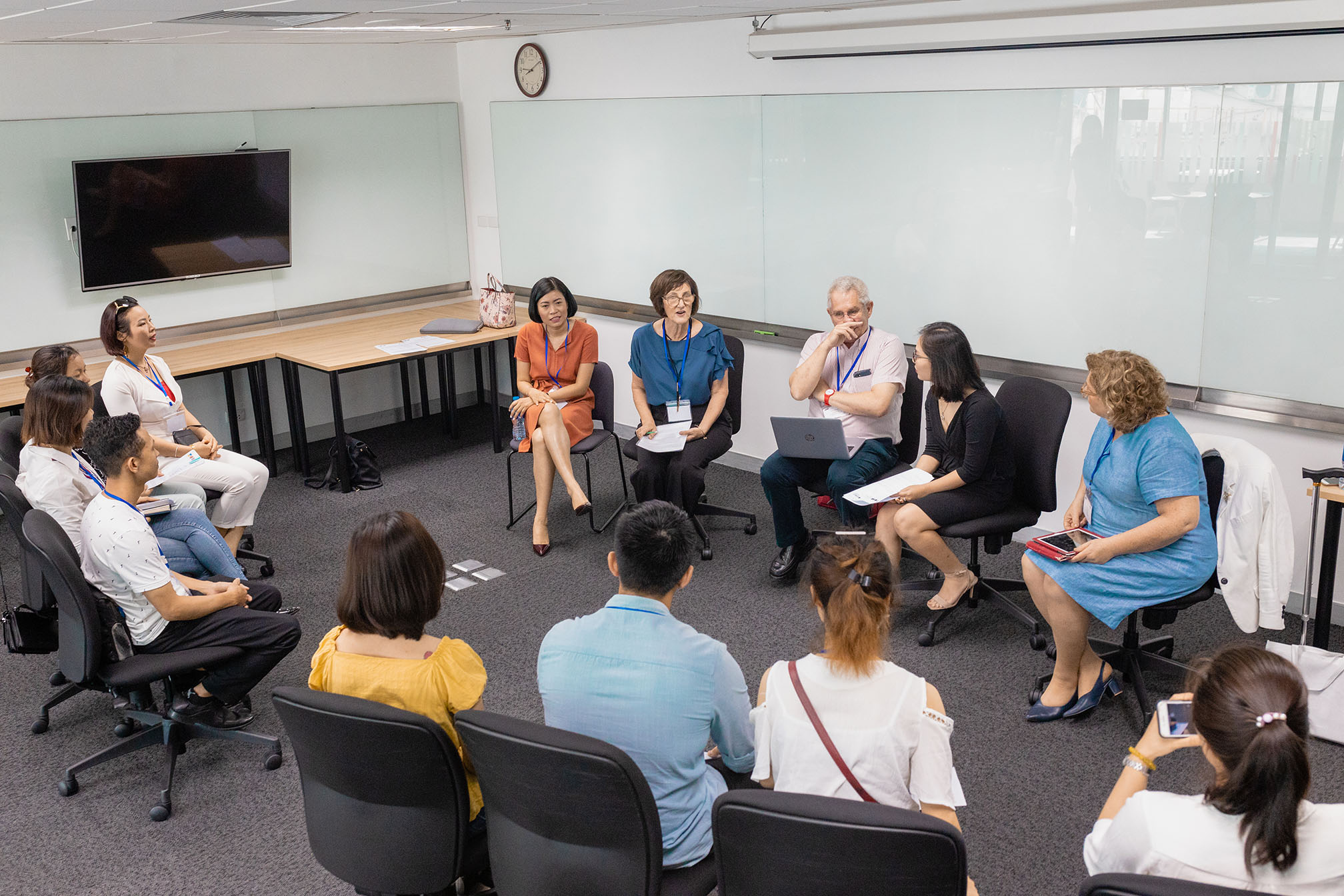 KOTO General Director Thao Nguyen (far left) shared her story with KOTO alumni and other guest speakers.