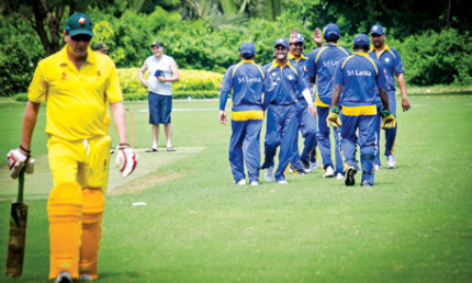 A batsman is dismissed during a VCA league game at RMIT Vietnam’s oval.