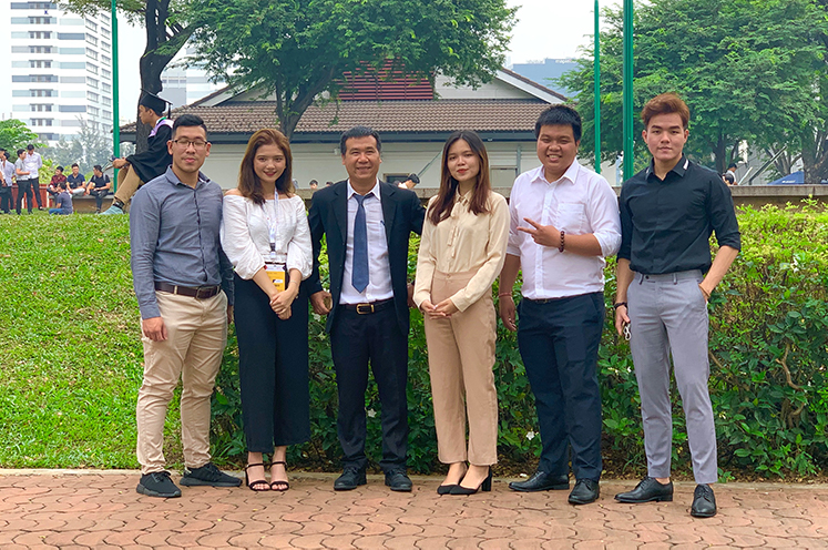 The team with RMIT lecturer Mai Duc Huy Truong (pictured on the left), who has coached them for four months in the lead up to the competition. 