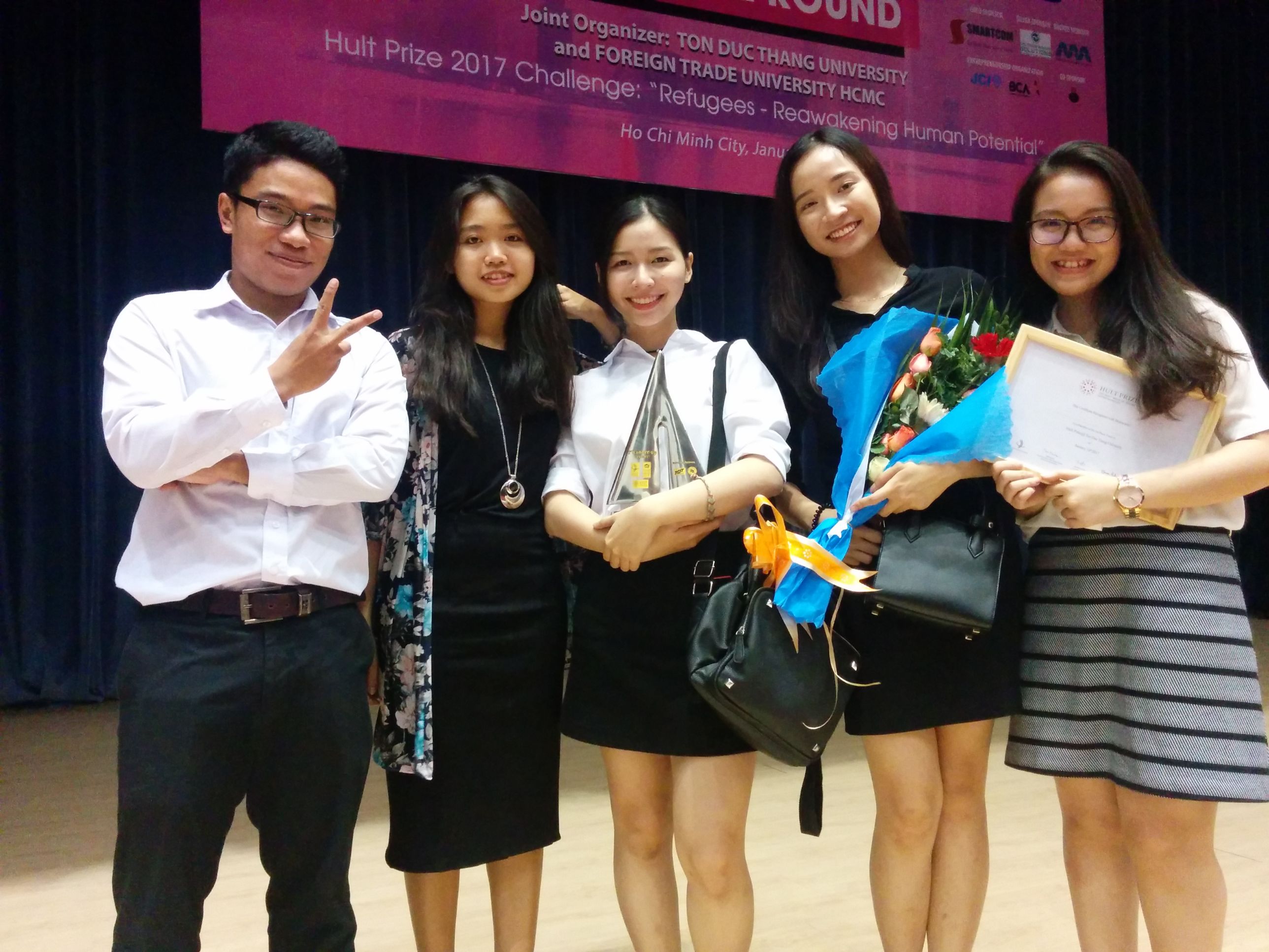 (From right) RMIT Vietnam students La Thuy Tien, Truong Quynh Anh, Dang Nguyen Nhu Quynh, and Dang Kim Thien Huong at the Vietnam National Finals for the Hult Prize 2017.