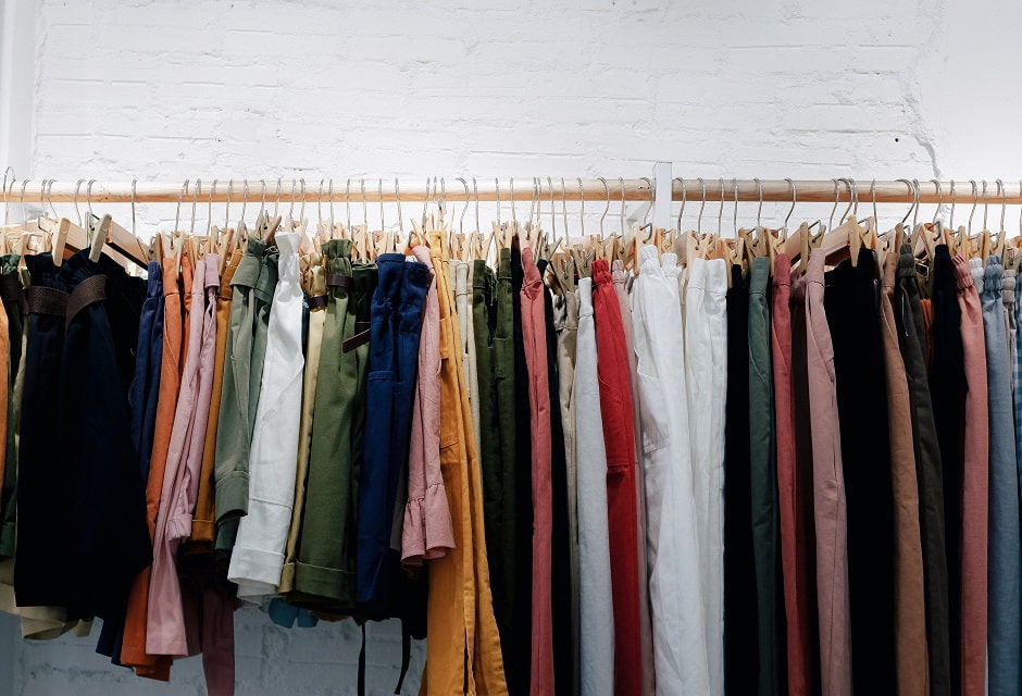 A rack of colourful shorts and trousers