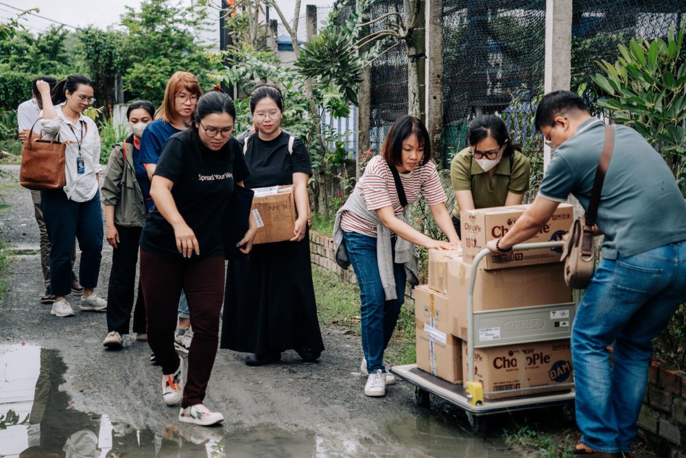 Staff volunteers from RMIT delivered donated books and school supplies to an orphanage in Ho Chi Minh City.