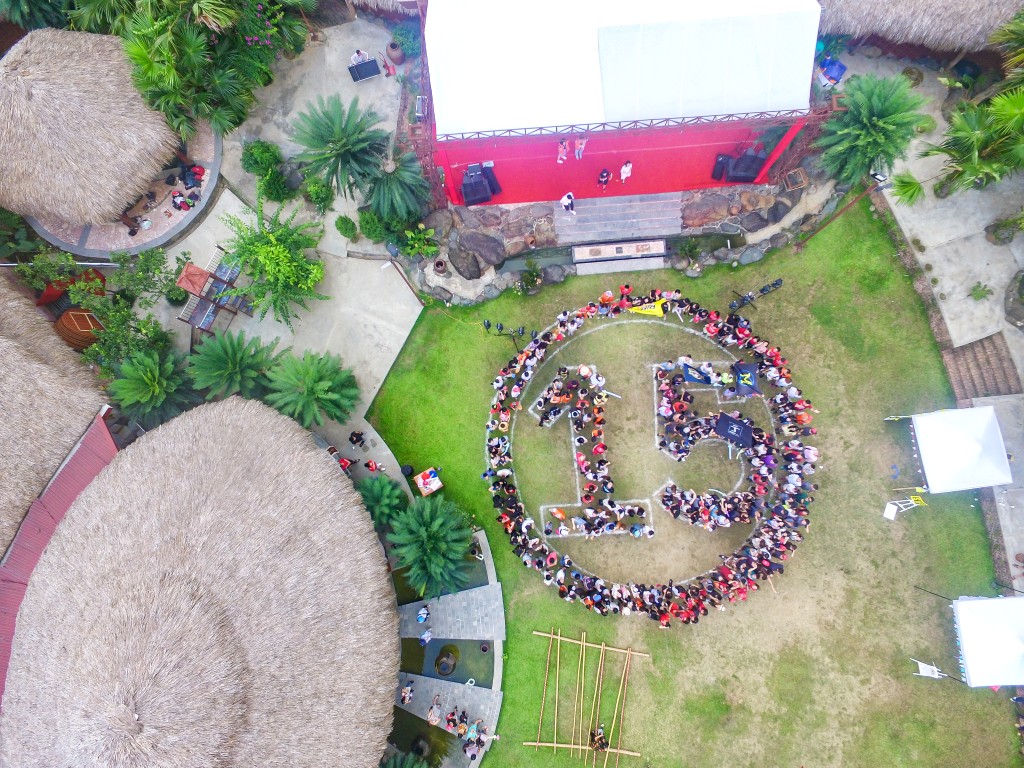 Participants gather for a group photo to celebrate the 15th Anniversary.