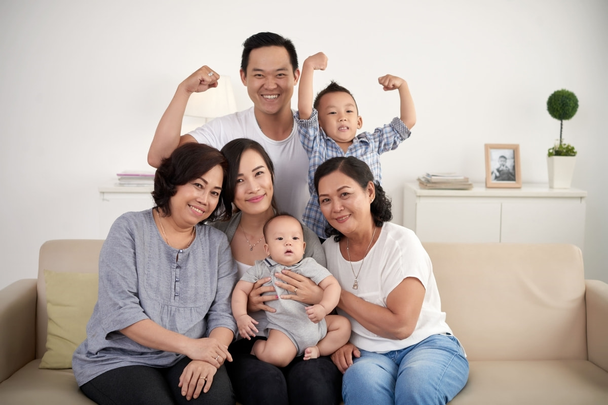 thumbnail-asian-extended-family-with-baby-toddler-posing-together-around-couch-home.jpg