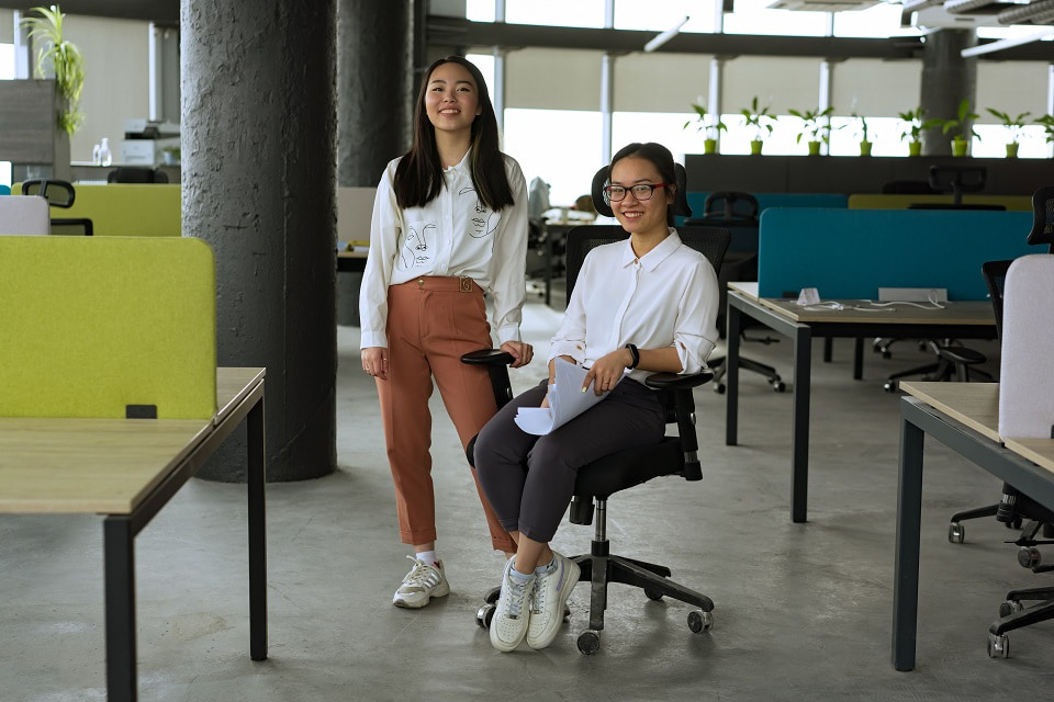 two young employees in an office