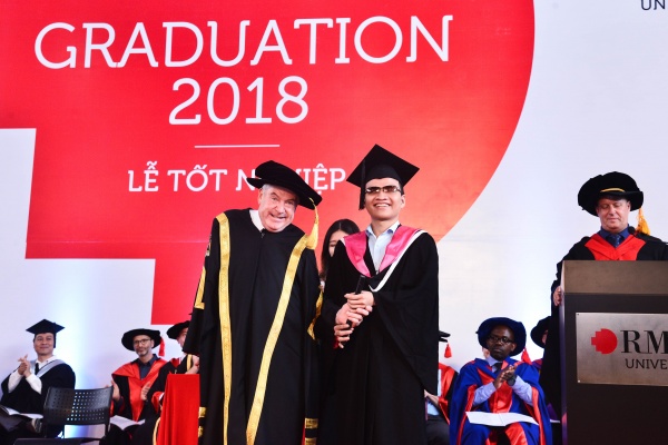 Vinh accepted his degree from Vice-Chancellor Martin Bean, at the graduation ceremony in Saigon.