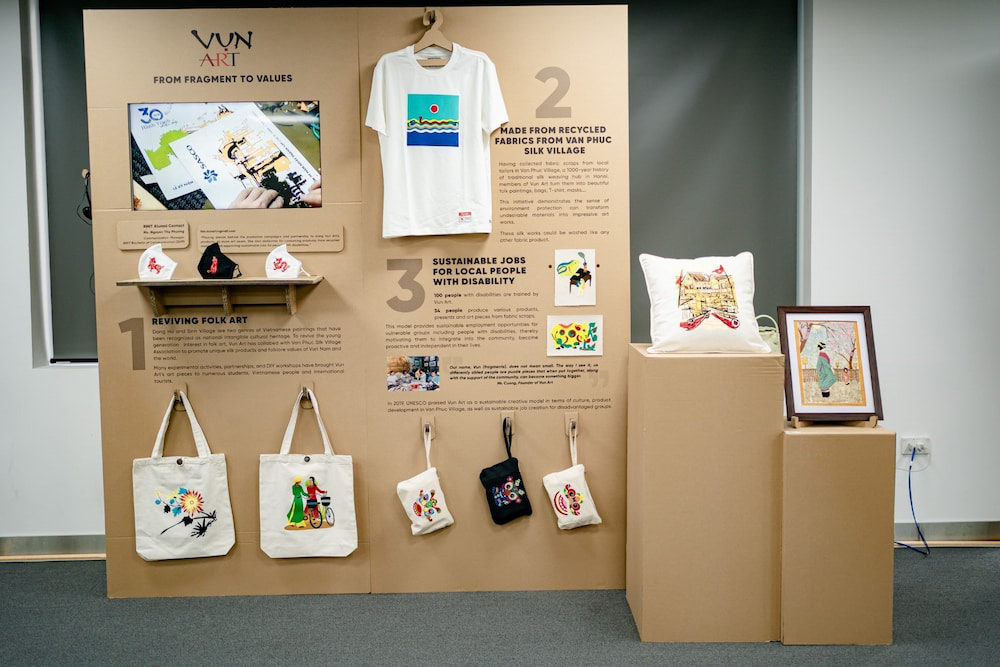 Vun art booth showing products made from scrap fabrics.