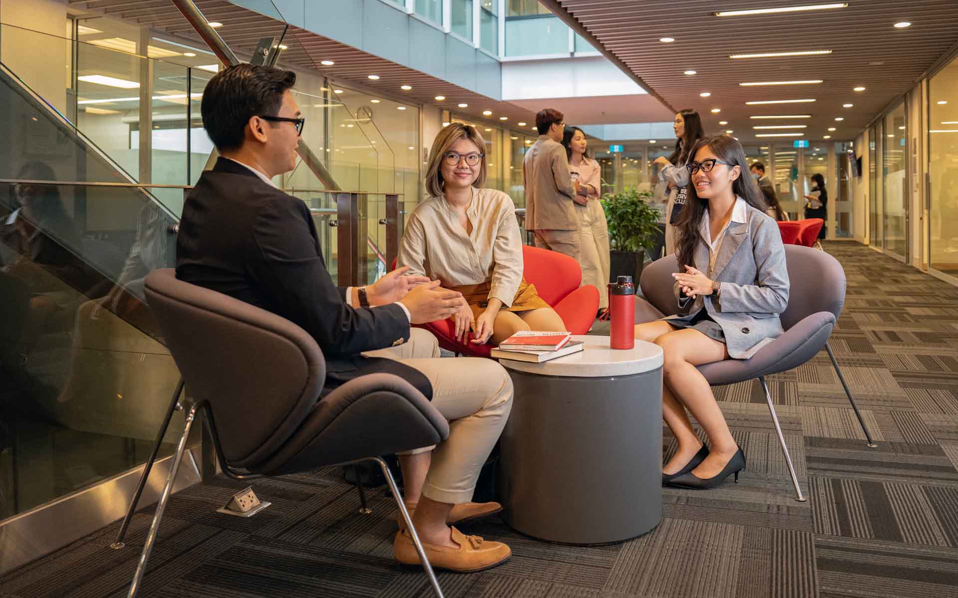 female-students-smiling-and-talking