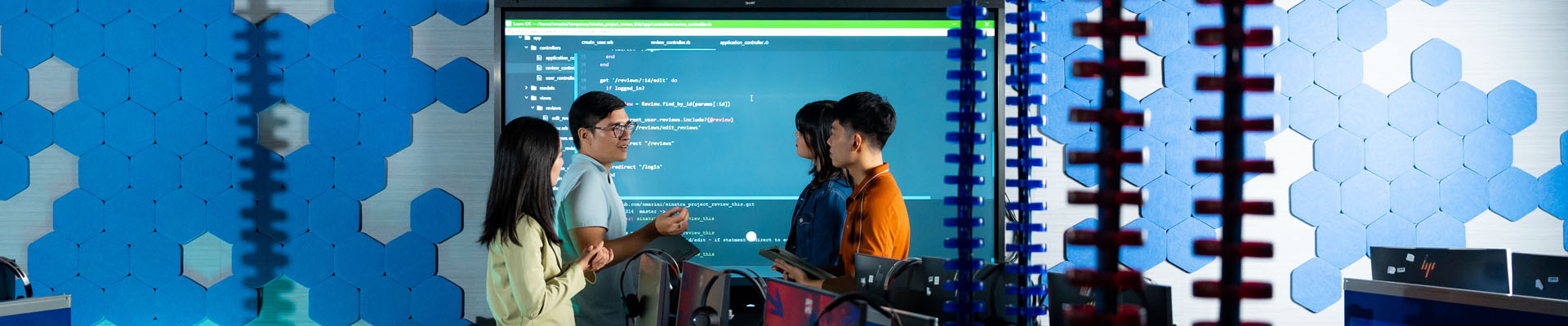 a group of students chatting in the working room