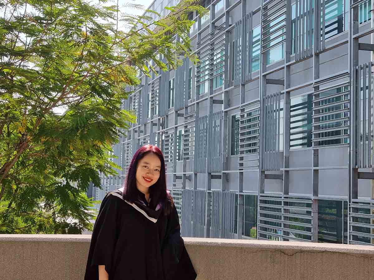 Hanh Truong standing in RMIT campus