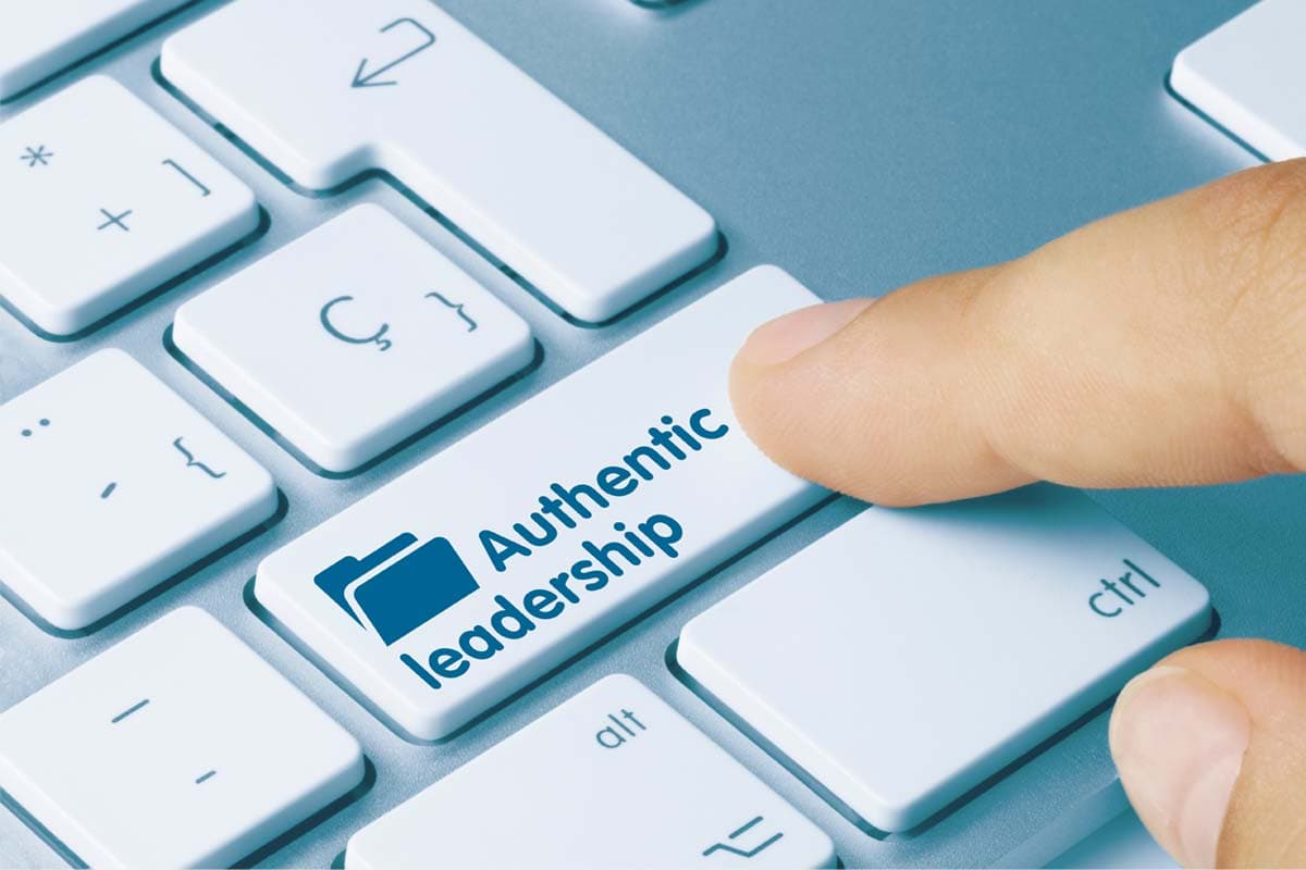 Keyboard with the words 'authentic leadership' on it