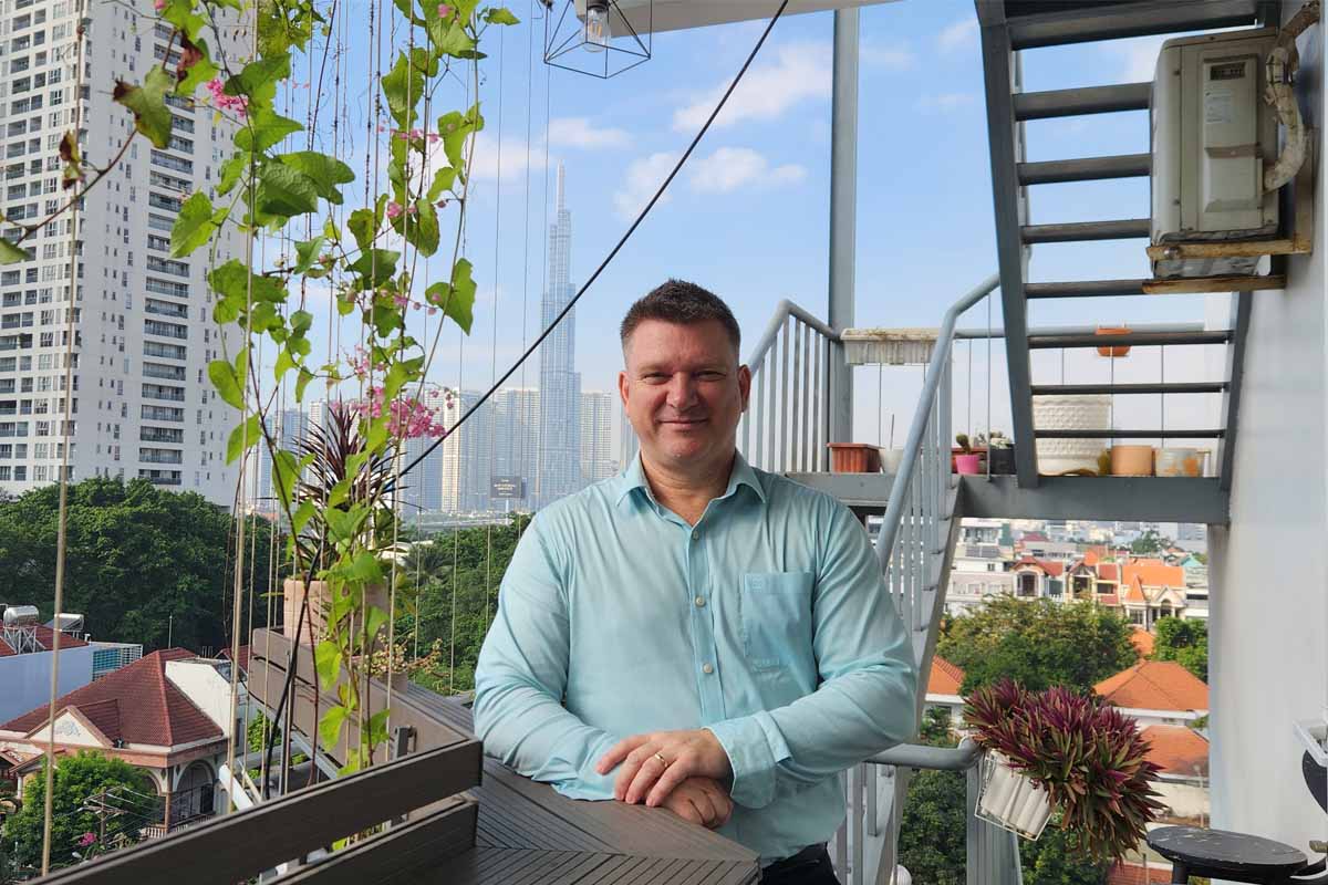 a man standing on a balcony