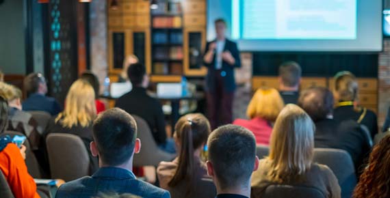 a group of people in a business workshop