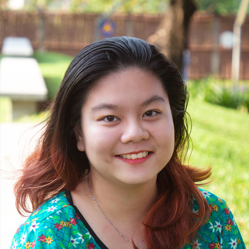 a headshot of a woman smiling