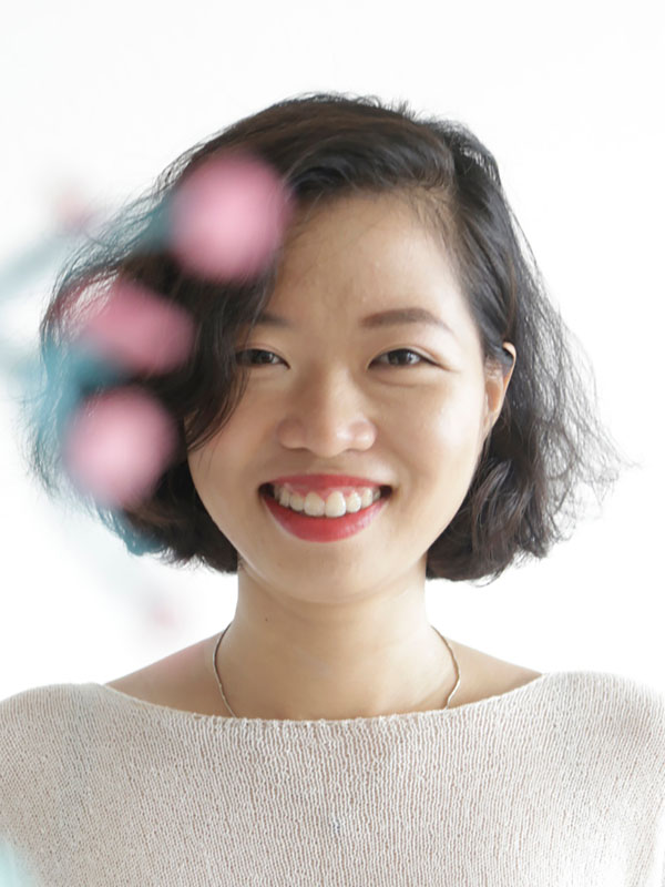 a headshot of a woman smiling 