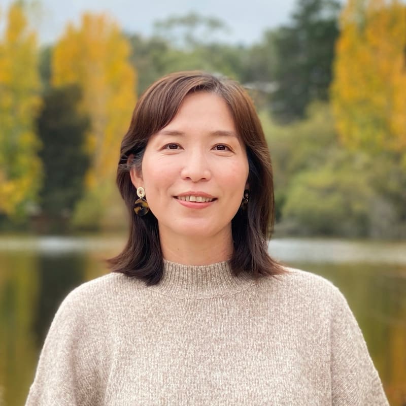 a headshot of a woman smiling 