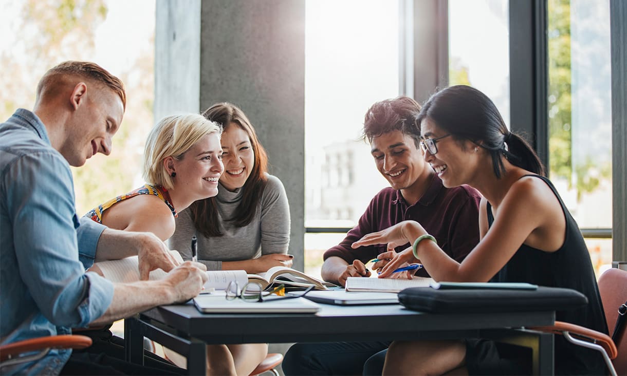 Group of students of multiple ethnicities in a meeting